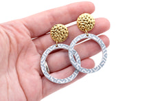 Load image into Gallery viewer, Blue Cutout Circle White Print Dangles