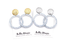 Load image into Gallery viewer, Blue Cutout Circle White Print Dangles