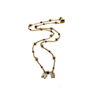 Gold Rhinestone NE Necklace